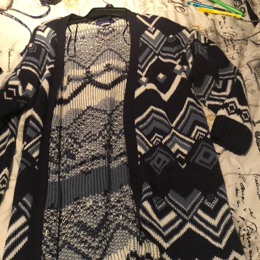A blue cardigan